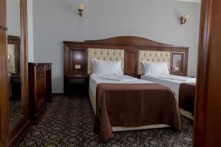 Отель Hotel Giuliano Бухарест Стандартный двухместный номер с 2 отдельными кроватями-2