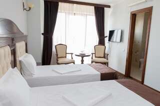 Отель Hotel Giuliano Бухарест Стандартный двухместный номер с 2 отдельными кроватями-4