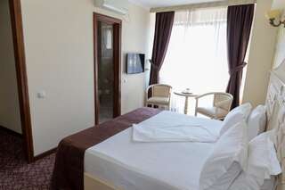 Отель Hotel Giuliano Бухарест Стандартный номер с кроватью размера "king-size"-2
